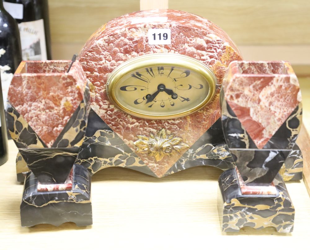 A French rouge marble mantel clock garniture